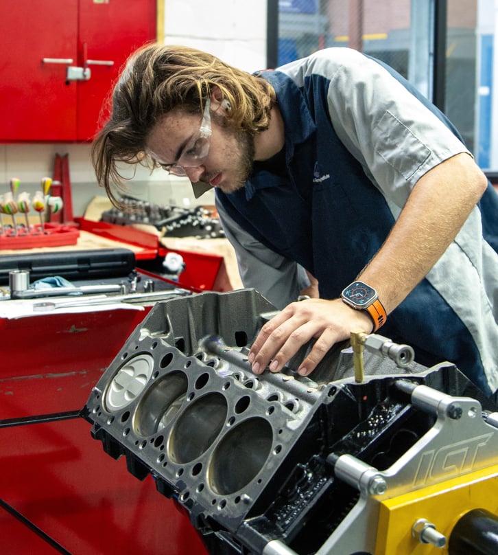 Mechanic Working on Engine